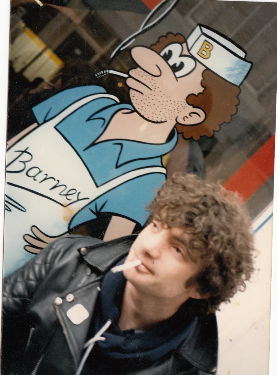 Nick’s friend Paul beside the original Barney window character that was modelled on him.